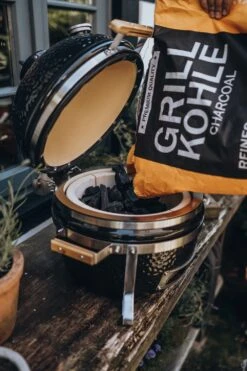 Monolith ICON Black Keramikgrill Tischgrill Inkl. Gestell -Outdoor-Grillladen Monolith Icon Holzkohle befuellen